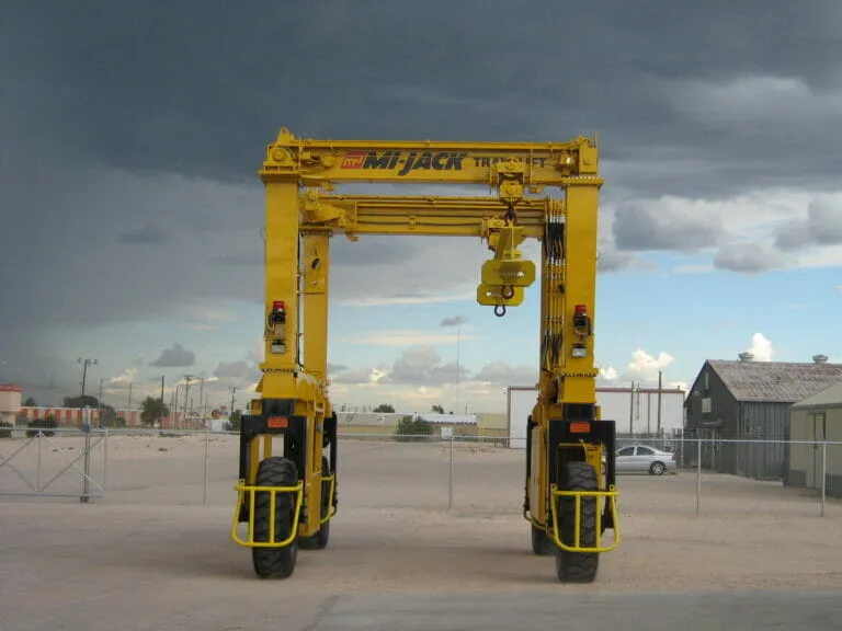 yellow mj30hd travelift against a stormy sky