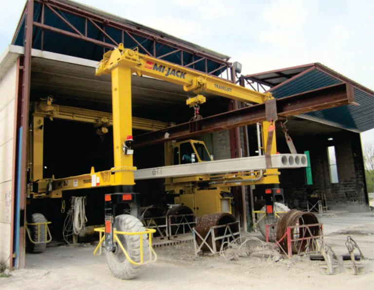 yellow mj70hd moving from indoors to outdoors carrying load