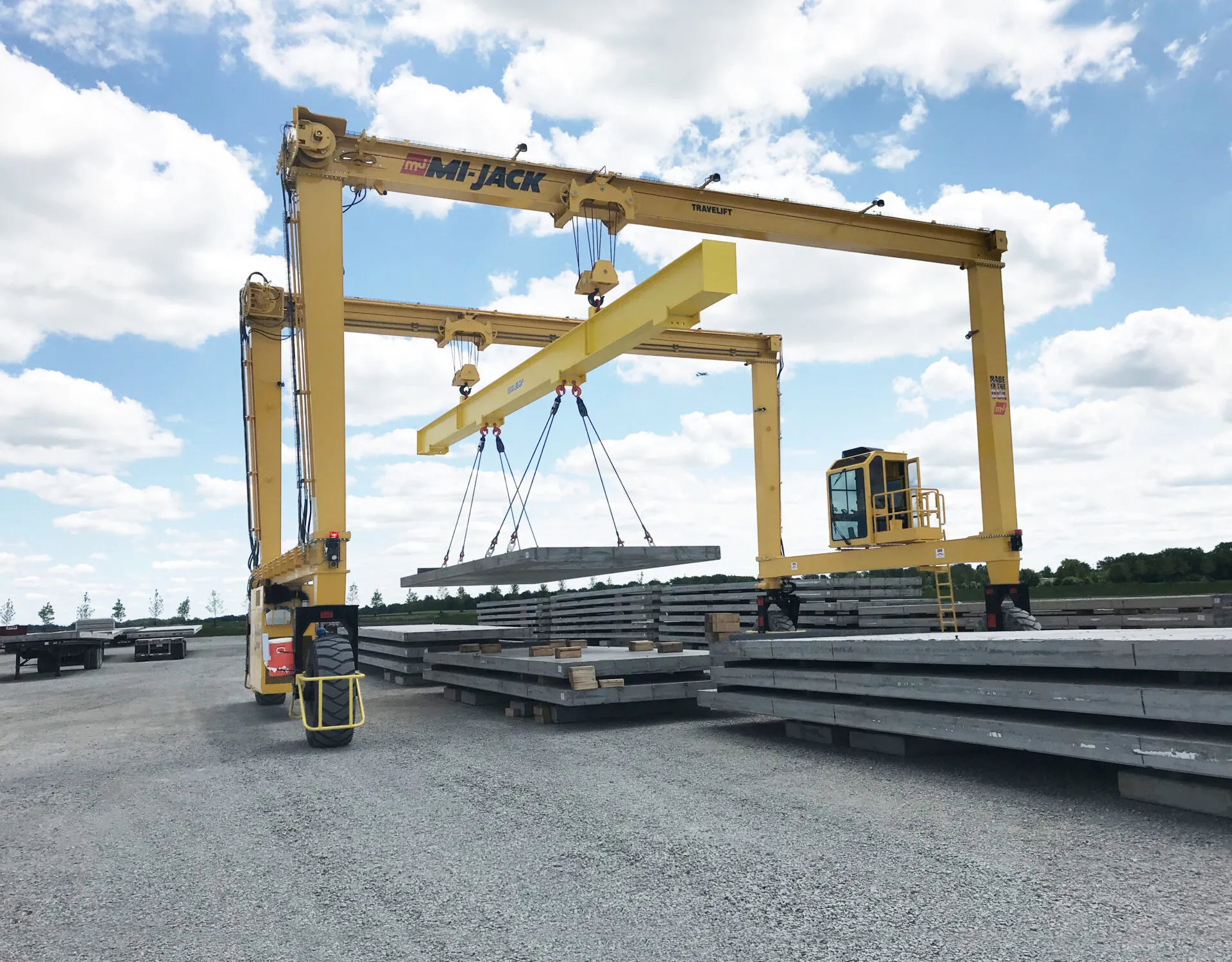 a mi-jack mj40hd using custom attachment to lift slab