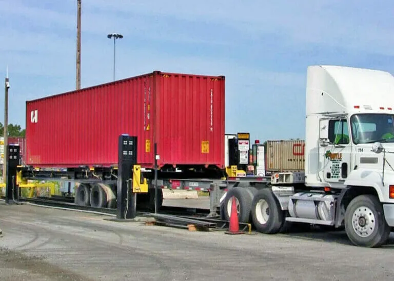 truck using mi-jack's flipper container system to remove container