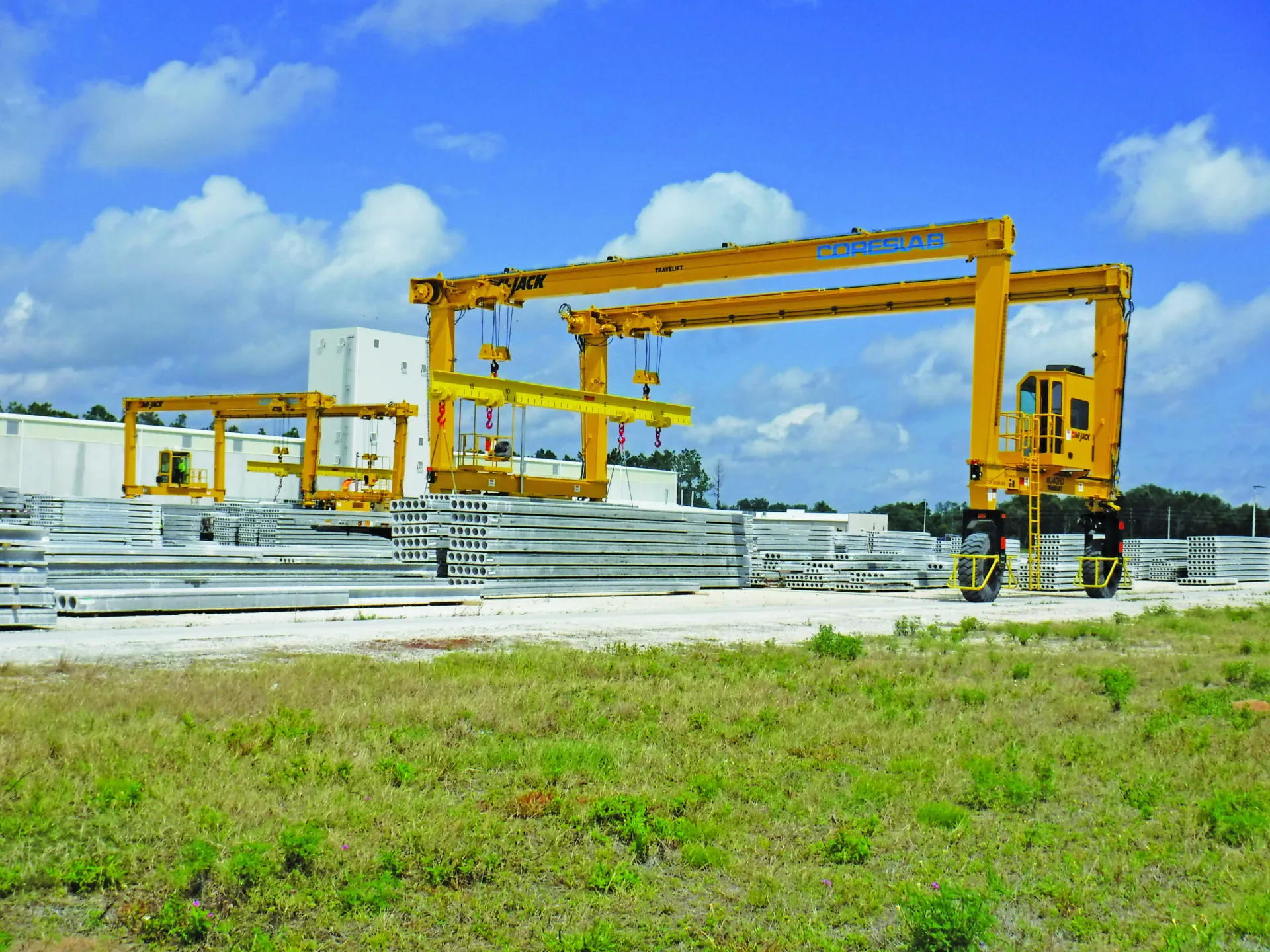 a mi-jack mj40hd travelift in a steel yard