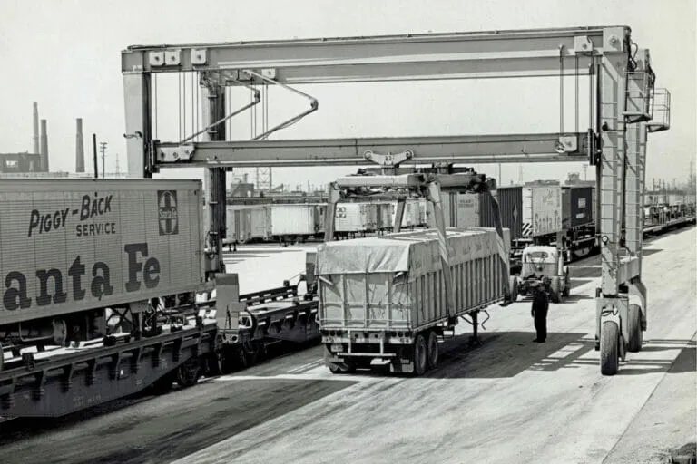 One of Mi-Jack's original self propelled rubber tired gantry cranes on site