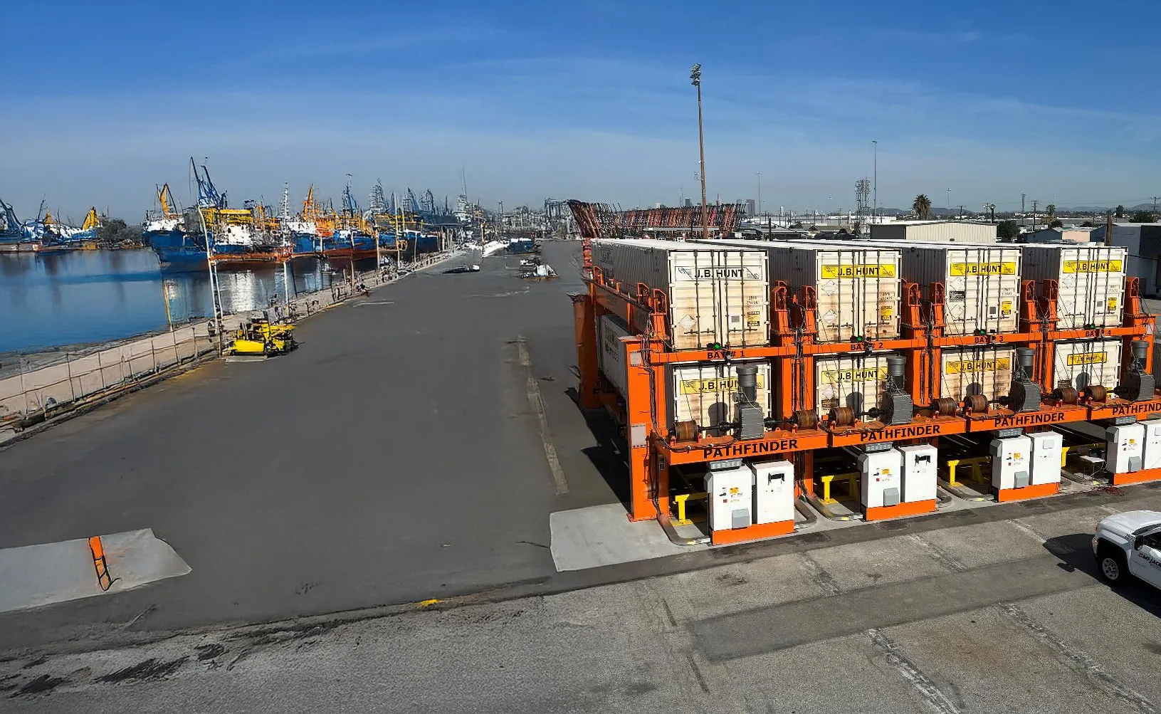 mi-jack pathfinder loaded with containers at terminal