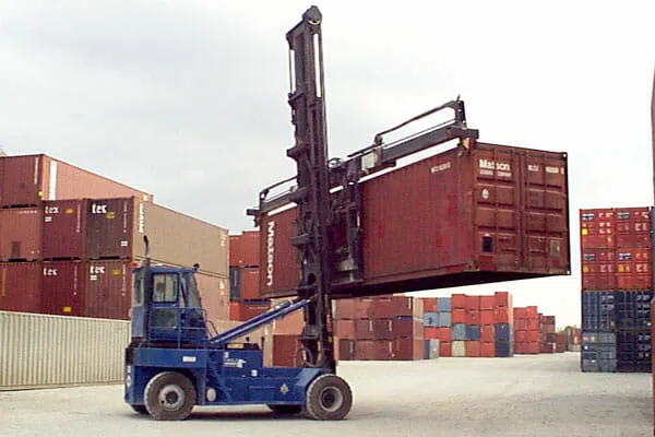 blue Taylor XEC-155/6 carrying red empty container