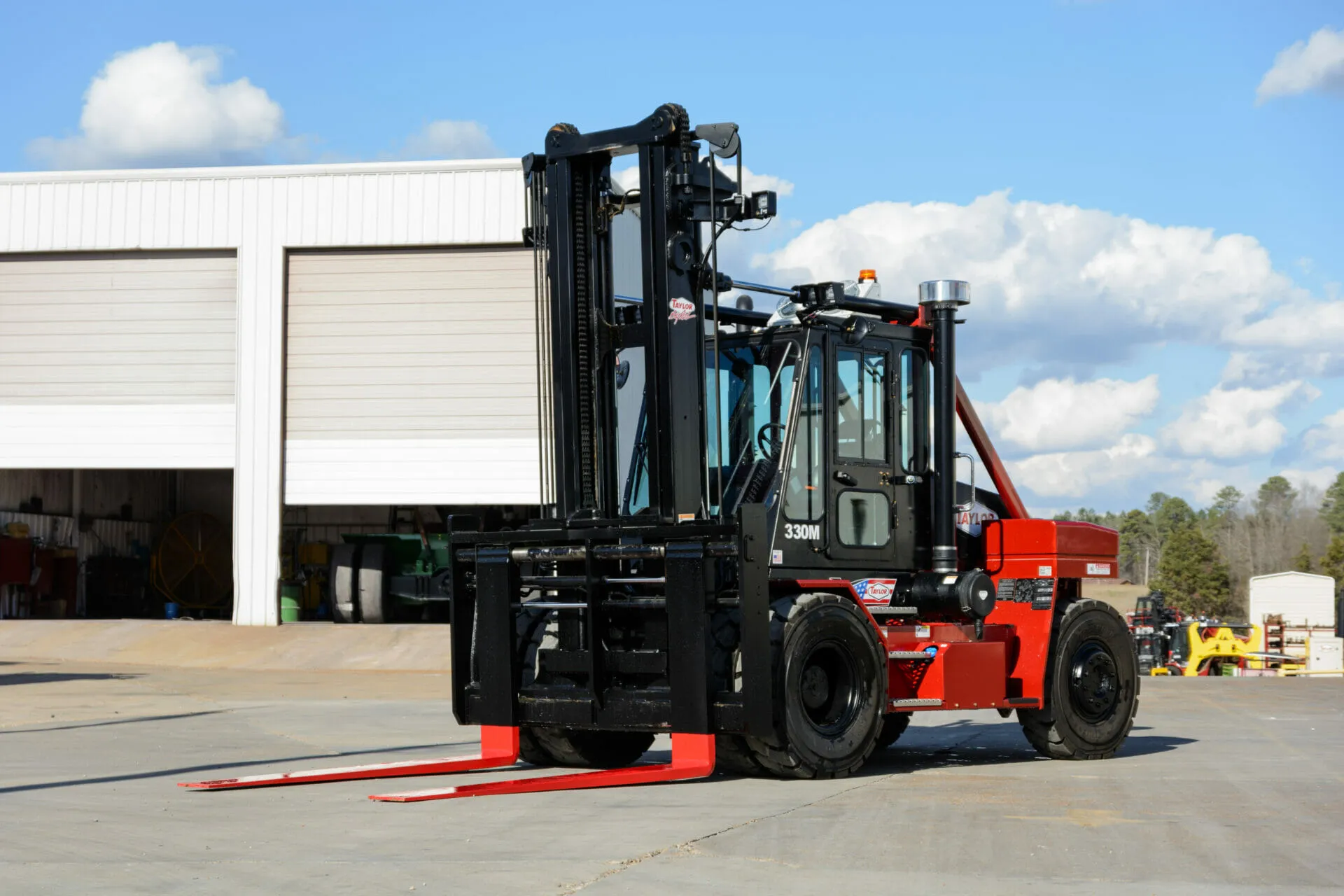 the back of a red taylor x-330m heavy duty forklift