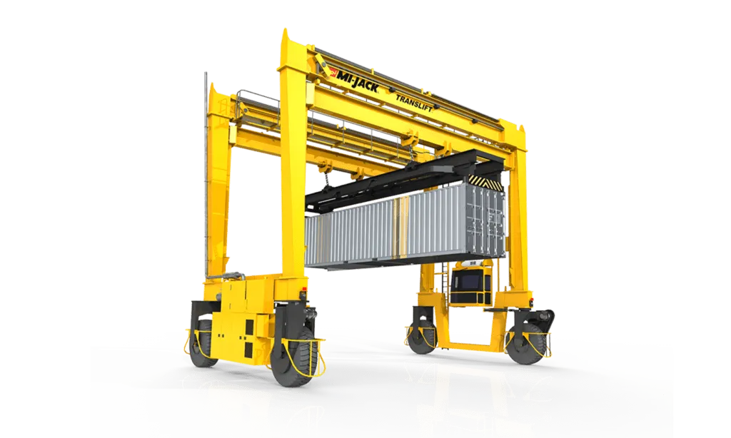 a cutout of a Mi-Jack 1200R translift rtg crane lifting a shipping container