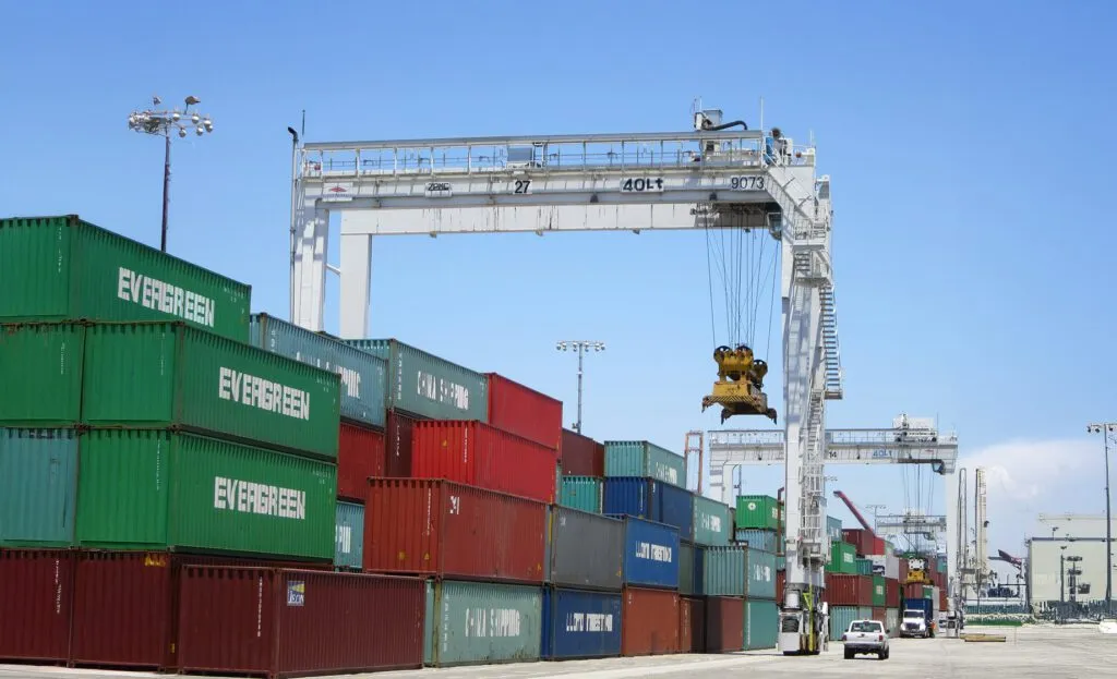 a mi-jack electric hybrid rtg in a shipping container terminal